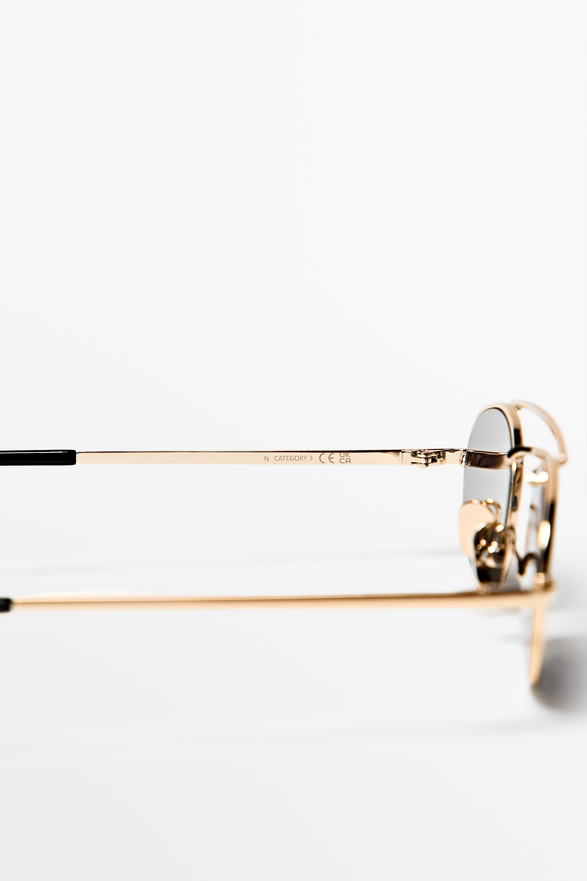 Double bridge oval sunglasses